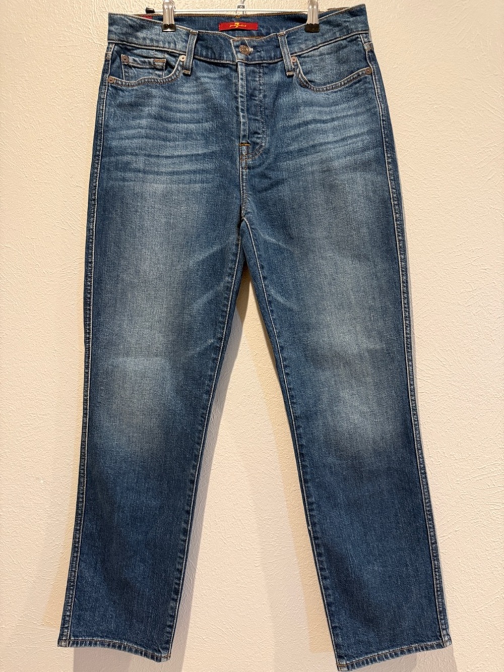 7 For All Mankind Medium Blue Straight Jeans. Waist 15.5”. Rise 10”. Inseam 27”